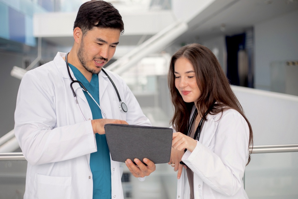 Healthcare staff reviewing data