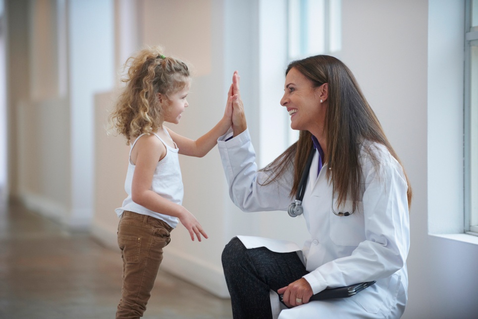 Doctor giving a patient a high five